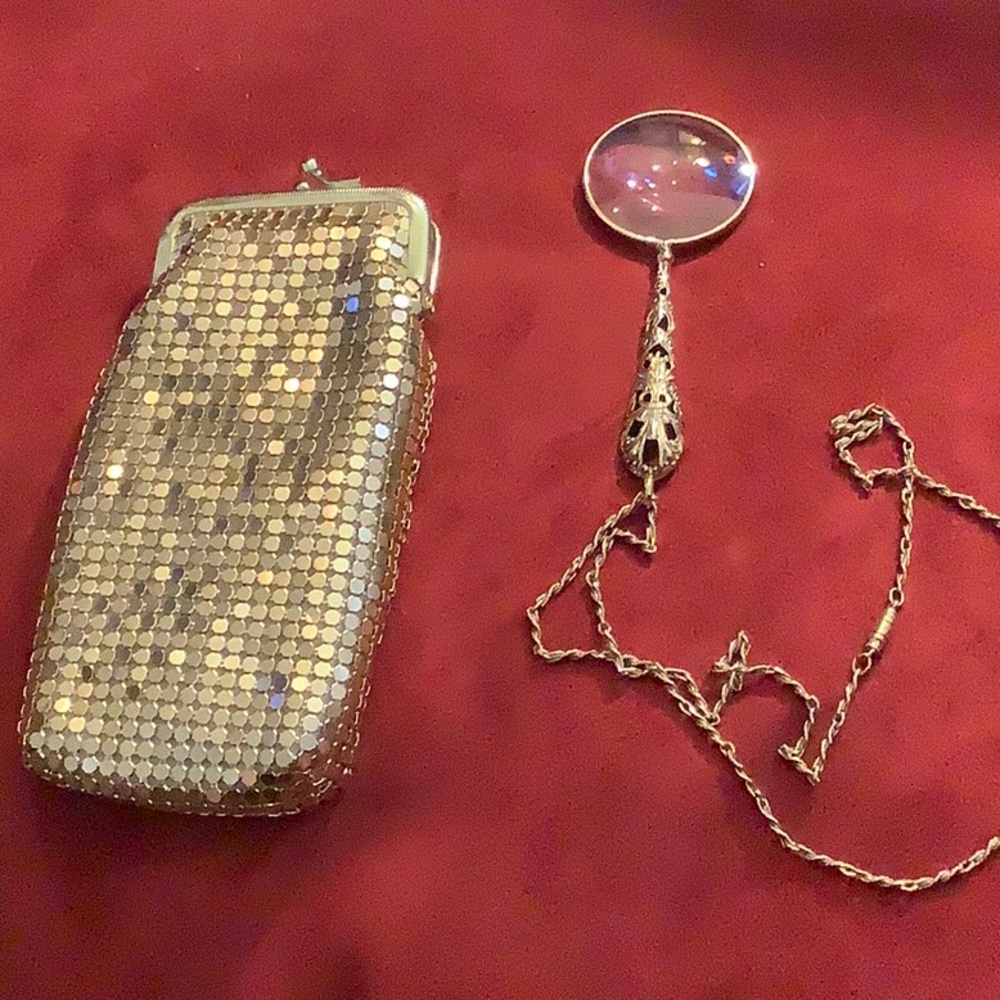 Vintage eyeglass case with magnifying glass